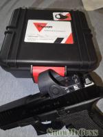 Trijicon sro or holosun eps carry green dot