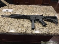 CMMG 9MM with 10 - 32 round magazines