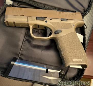 Springfield Hellcat PRO.  This is same as new - 2/4