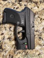 Ruger LCP .380 caliber with Viridian Lazer and 100 rounds of Ammo