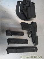 Taurus G3XL 9mm Carry Package – 3 Magazines (Ext/High-Cap) + Paddle Holster